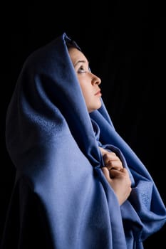 Portrait of religious woman looking with hope