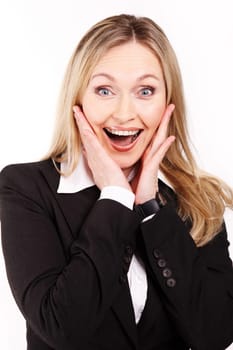 Portrait of amazed businesswoman touching her face