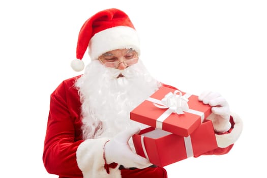Photo of happy Santa Claus looking into red giftbox in isolation