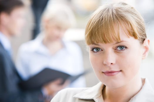 Close-up of charming lady in working environment