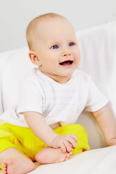 Vertical image of small girl looking aside