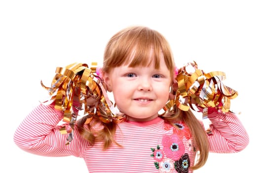 Portrait of happy girl with decorative ribbons looking at camera