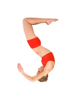 Image of young girl practicing physical exercise looking like number five