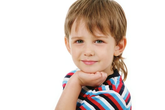 Portrait of cute boy looking at camera on a white background
