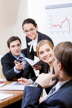 Photo of business group having hot discussion during seminar