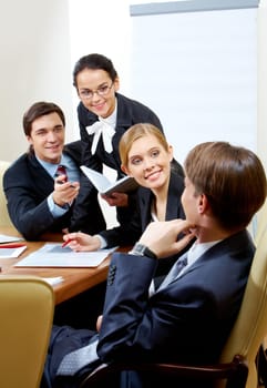 Photo of business group having hot discussion during seminar