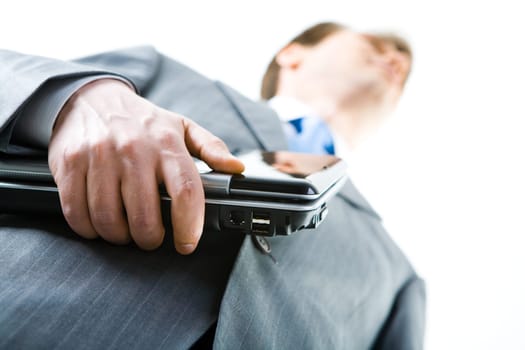 Close-up of businessman with the laptop on a white background