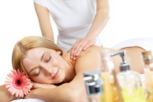 Portrait of calm female having rest during procedure of massage