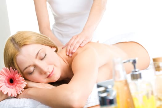 Portrait of blonde taking pleasure from massage