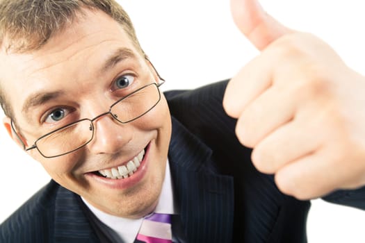 Close-up of happy man with his thumb up holding it in front of him