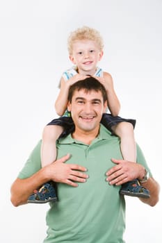 Portrait of man holding smiling son on the neck