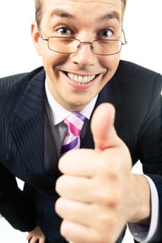 Close-up of happy businessman showing thumb up and looking at camera with smile