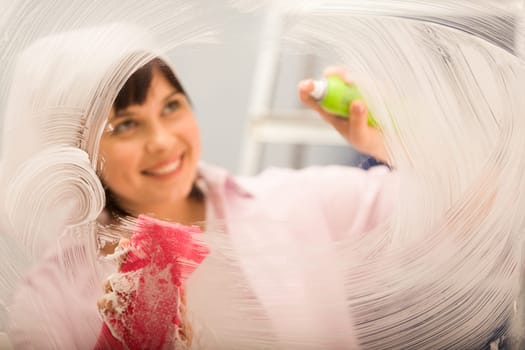 Image of window being washed by housekeeper
