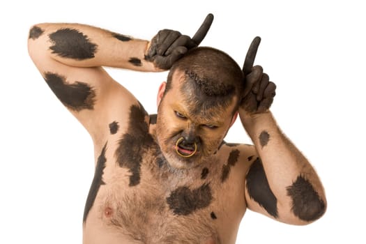 Photo of dissatisfied man painted as ox showing horns over white background