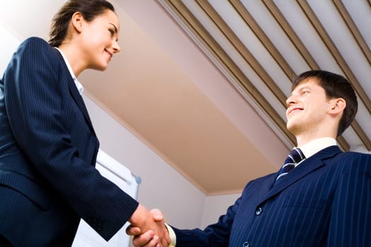 Business handshake meaning a successful bargain of two partners