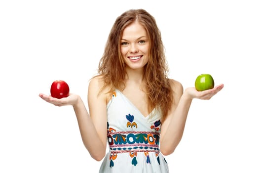 Portrait of a girl holding red and green apples