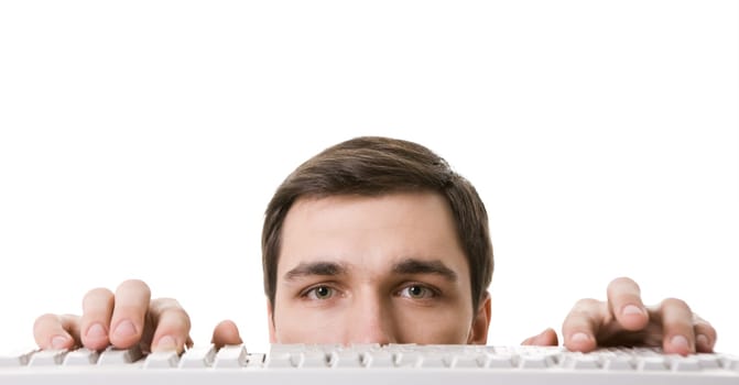 Photo of face of businessman near white keyboard