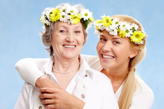 Portrait of two pretty women with different age