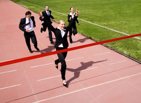 Image of business race with winner in front