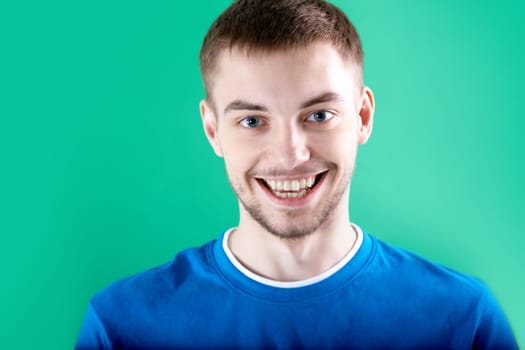 Portrait of young man looking at camera with smile