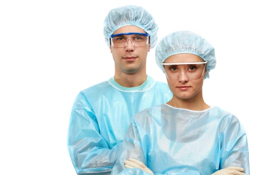 Portrait of two surgeons, a man and a woman isolated on white