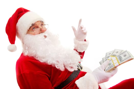 Photo of happy Santa Claus with dollar bills gesturing with raised forefinger
