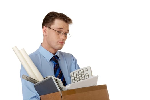 Portrait of businessman holding box with documents and other things