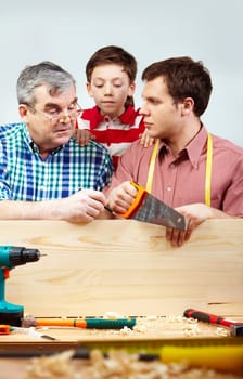 Family of men working with diy tools