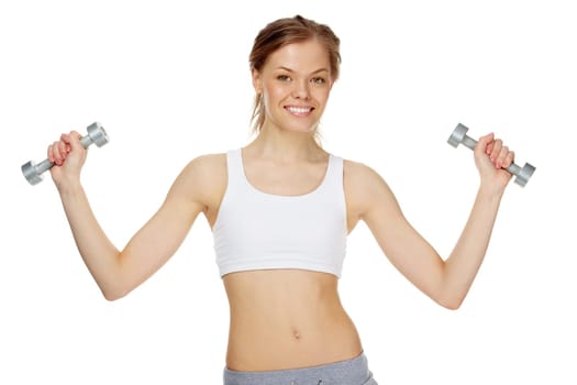 Portrait of young pretty woman holding dumbbells