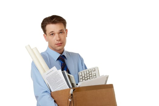 Portrait of businessman holding box with documents and other things