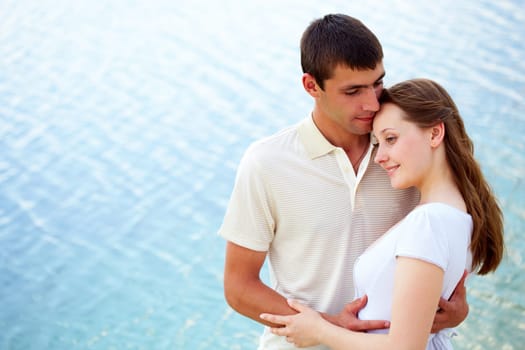 Photo of peaceful couple enjoying being together during summer vacation