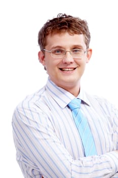 Portrait of young handsome businessman with crossed arms looking at camera