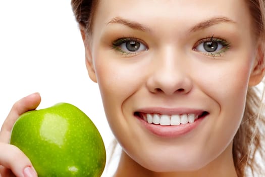 Portrait of pretty woman with smile holding green apple