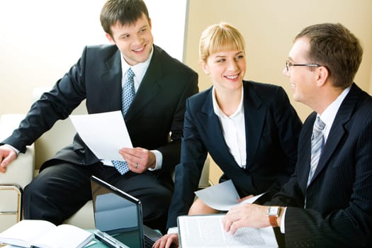 Business man and woman looking at boss of company during   negotiations