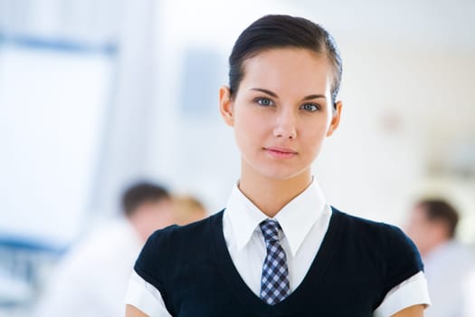 Photo of serious female looking at camera