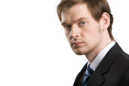 Smart serious businessman looking at camera on white background