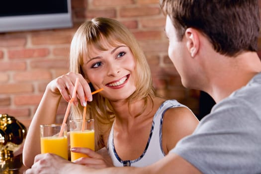 Photo of  a beautiful amorous woman listening to the man