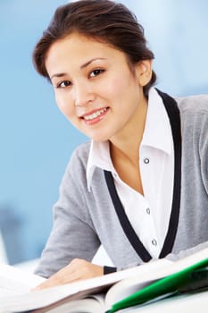 Portrait of smiling businesswoman looking at camera