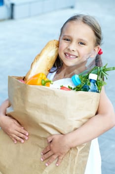 Portrait of a little girl with foodstuff