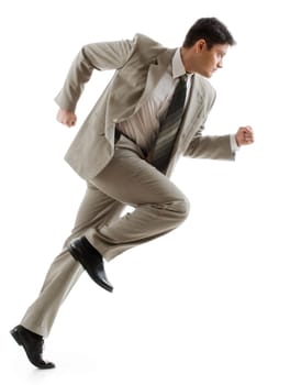 Image of confident businessman running on white background