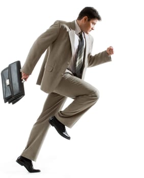 Image of serious businessman hurrying to his work