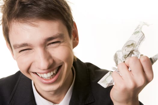 Photo of laughing male with crumpled dollar banknote in hand over white background