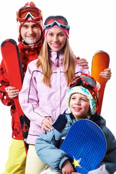 Portrait of happy family with snowboards looking at camera on white background