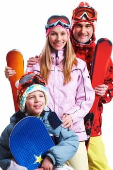 Portrait of happy family with snowboards looking at camera on white background