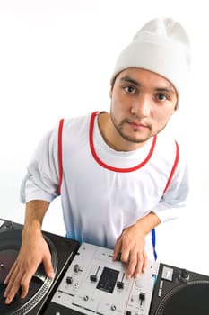 Portrait of smart deejay spinning turntable