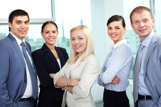 Portrait of five businesspeople looking at camera and smiling