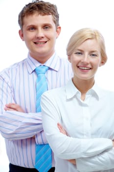 Portrait of successful businesswoman looking at camera with happy partner behind her