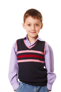 Portrait of smiling boy looking at camera over white background