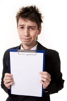 Portrait of young businessman with blank paper looking at camera annoyingly