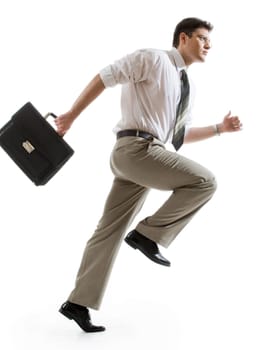 Busy businessman with briefcase running to important meeting